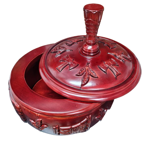 Close-up of carved wood lid – Afro-Caribbean altar centerpiece