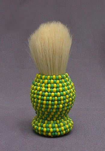 Brush for Ifa covered in beads