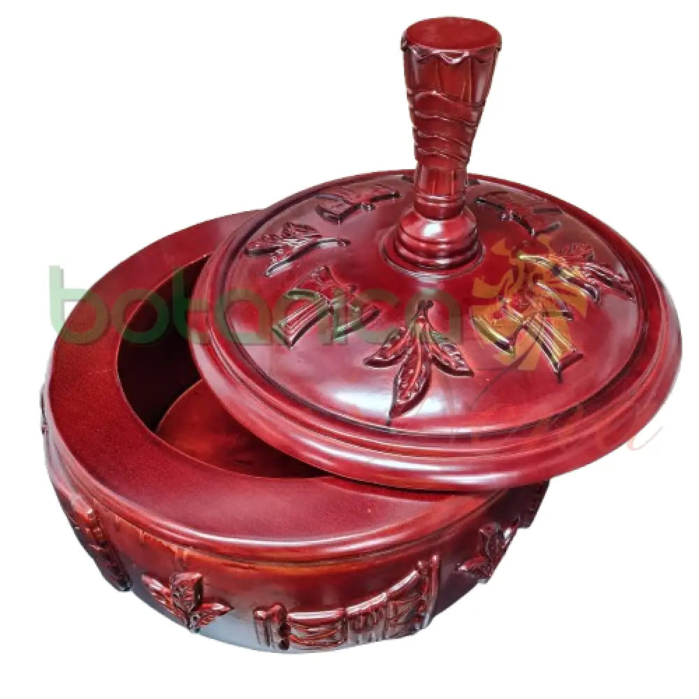 Close-up of carved wood lid – Afro-Caribbean altar centerpiece