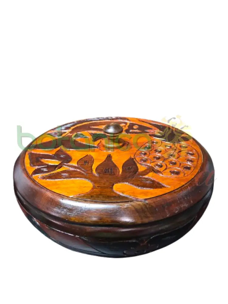 Orisha altar dish with sacred carvings – close-up of Shango figure