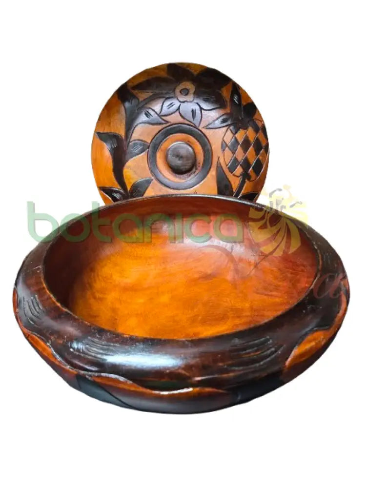 Detailed view of Orula symbol on handcrafted Santería batea