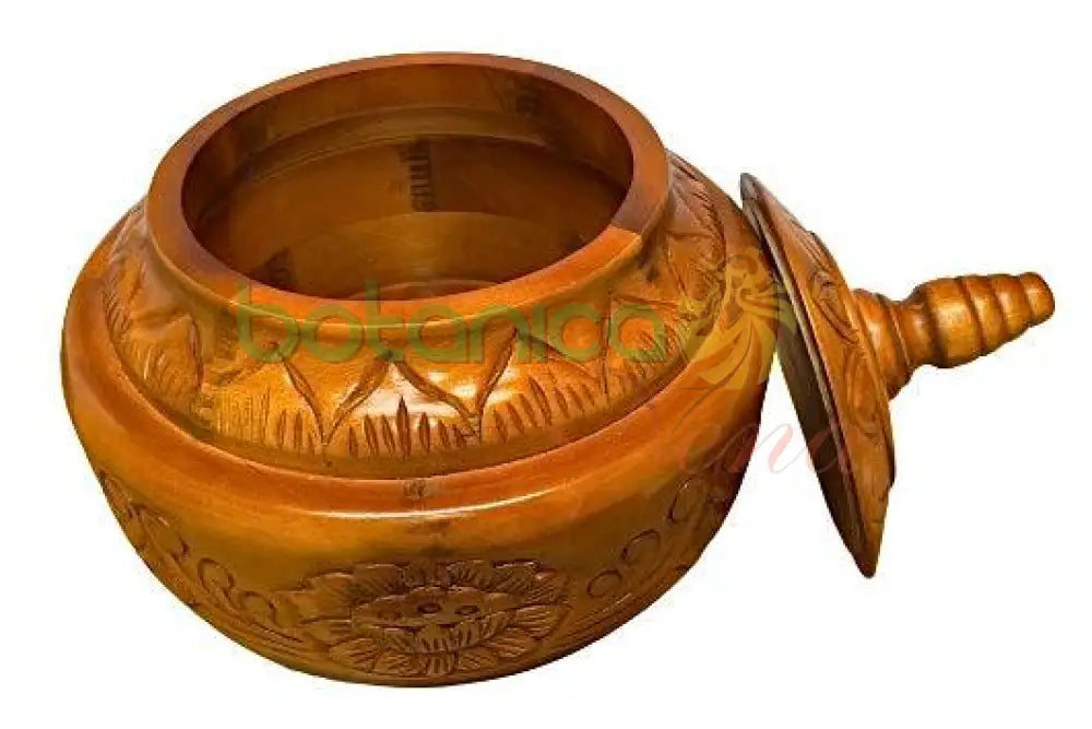 Side view of tall ceremonial container for Afro-Caribbean altar use