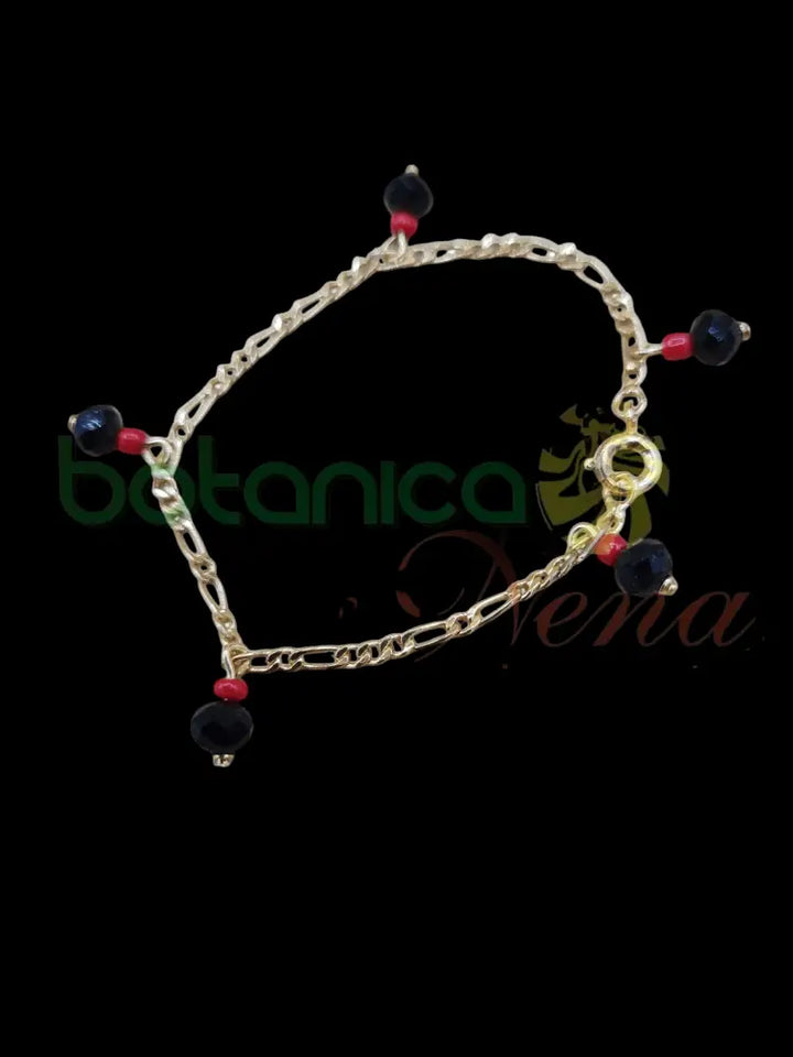 Pulsera azabache y coral para niños en dorador - Botanica Nena