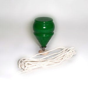 <p>spinning tops with cord</p>