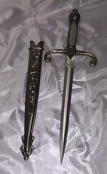 <p>stainless steel dagger with caseing metal roped handle</p>