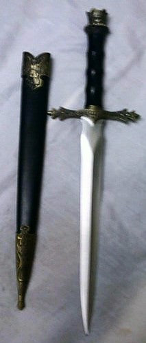 <p>stainless steel dagger with crown on handle</p>